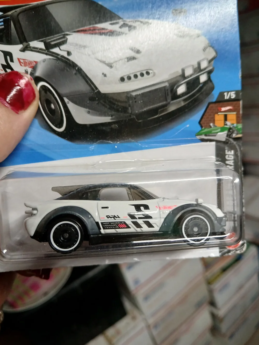 white Hot Wheels Mazda MX-5 Miata from the HW Dream Garage series bold black and
